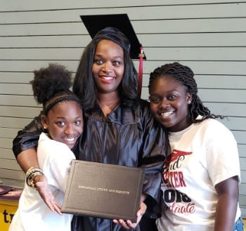 A-State online graduate Nickaylynn Barner with her daughters